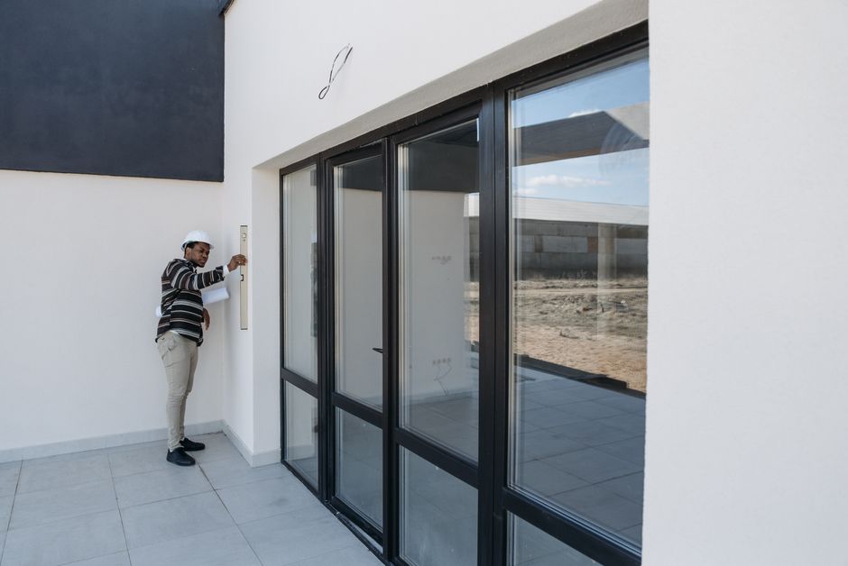 Contractor installing a high-quality wooden door